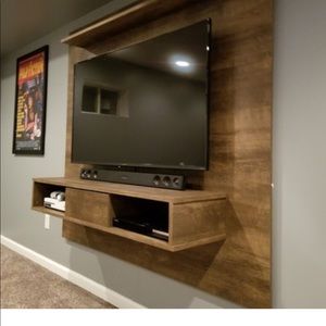 Tv entertainment wall mount. With damaged corners.
